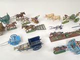 a lot of toy figurines that are on the table