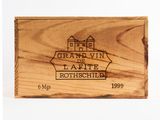 a close up of a wooden box with a label on it