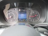 a car dashboard with a speedometer and gauges