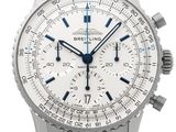 a close up of a watch on a white background with a blue second hand