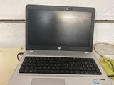 a laptop computer that is sitting on a table