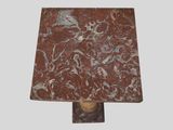 a lamp that is on a table with a marble base