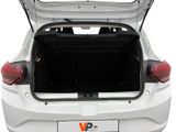the back of a white car with its trunk open on a white background