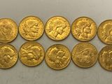 a group of six gold sovereigns