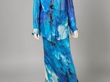 a blue and black dress and jacket on a mannequin mannequin mannequin mannequin mannequin mannequin mannequin manne