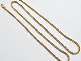 a gold plated necklace with a long chain and a clasp