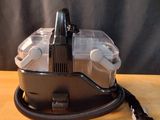 an image of a blow dryer on a wooden table