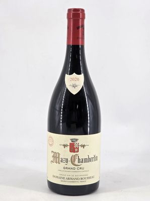 a bottle of wine that is sitting on a table