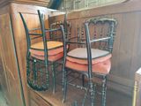 two chairs sitting next to each other in a room