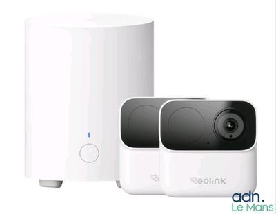 the two cameras are next to each other on a white surface