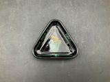 a triangle shaped container with a picture of a person on it