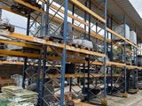 a large amount of pallets in a large warehouse