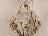 an image of a chandelier with five lights hanging from it ' s ceiling