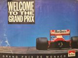 a picture of a grand prix poster on the wall