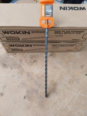 a box that has a drill in it on the floor