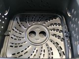 a close up of the inside of a small fryer
