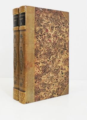 un gros plan d'un livre sur une surface blanche avec un fond blanc
