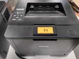 a printer that is sitting on top of a table