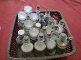 a wicker basket filled with bottles of various types of medicine
