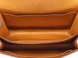 the inside of a brown leather purse on a white background