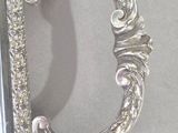 a close up of a silver object on a table