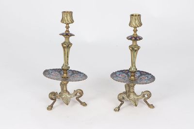 pair of antique brass candlesticks with blue and purple glass