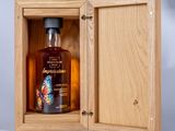 an image of a bottle of whisky in a wooden box
