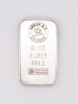 a close up of a silver bar on a white surface