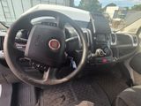 a steering wheel and dashboard of a truck