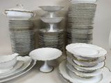 a lot of plates and bowls stacked on top of each other