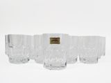set of six clear glass tumblers with a label on the side