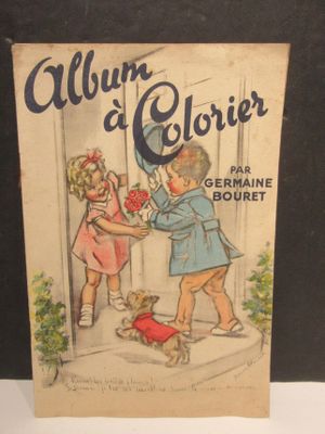 un vieux livre sur lequel figure l'image d'un garçon offrant une fleur à une fille