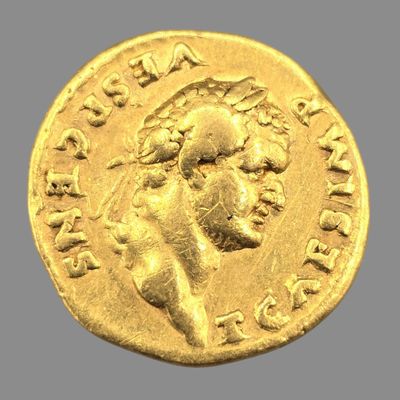 l'image d'une pièce d'or sur laquelle figure le portrait d'un homme