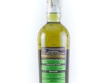 a bottle of whisky sitting on top of a white surface
