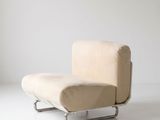 an image of a chair that is sitting on a white floor
