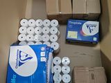 many rolls of toilet paper sitting in a box