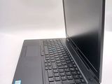 a laptop computer that is sitting on a table