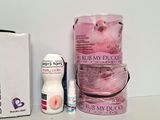 a box of toiletries and a bottle of lotion on a table