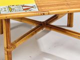 a small table with a book on top of it
