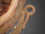 a close up of a piece of wood that has been carved