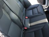 the back seats of a car are empty and the passenger seat is empty
