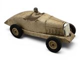 a toy car that is sitting on a white surface