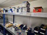 many boxes and boxes on the shelves in the room