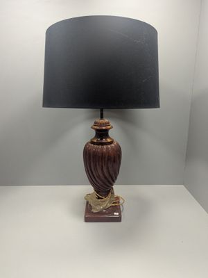 an image of a table lamp with a black shade on it