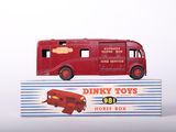 a toy truck that is sitting on top of a box