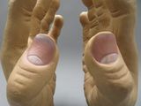 a close up of a person ' s feet and toes