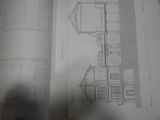 une image représentant un dessin d'une maison dans un livre