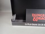 a black box with a red and black logo on it