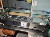 an image of a restaurant kitchen with a counter top