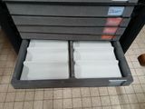 a stack of boxes that are sitting on the floor